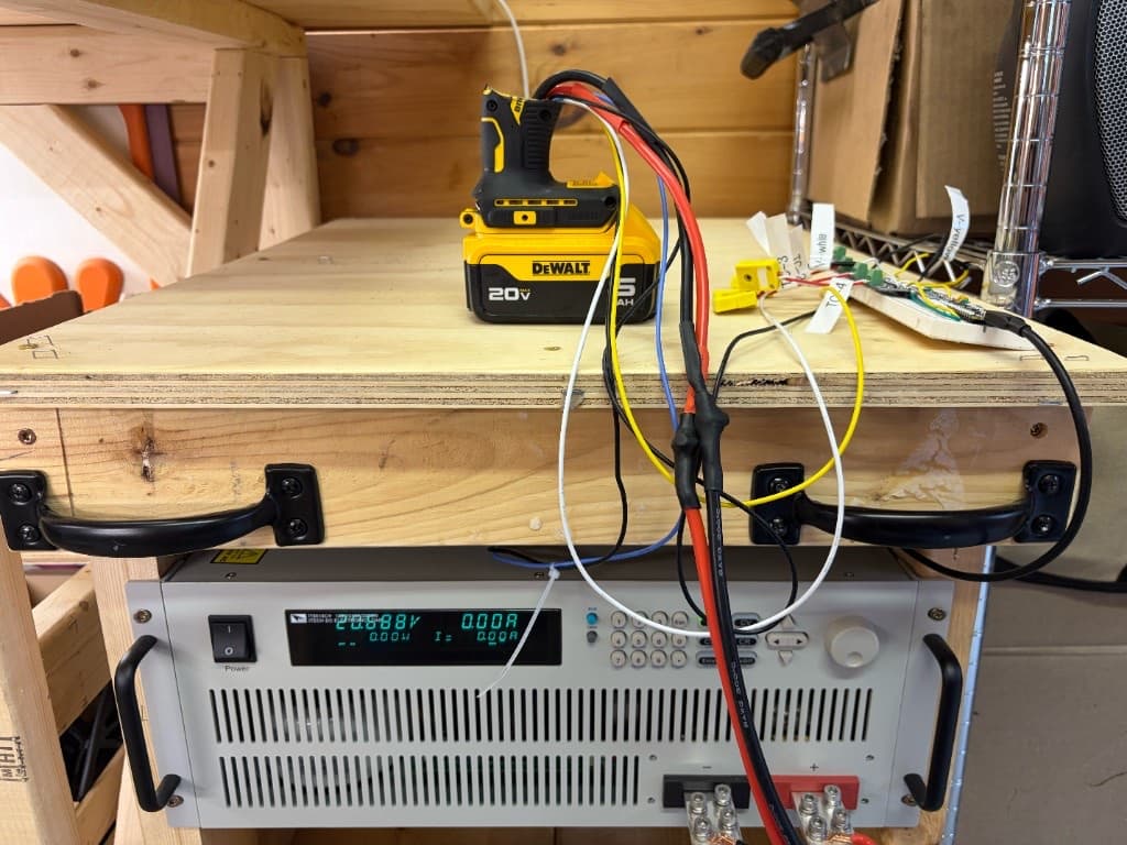 Test bench: an ITECH8516C+ programmable load connected to a DeWalt 20V battery through a dismantled drill handle, with arduino DAQ wiring for temperature and voltage logging