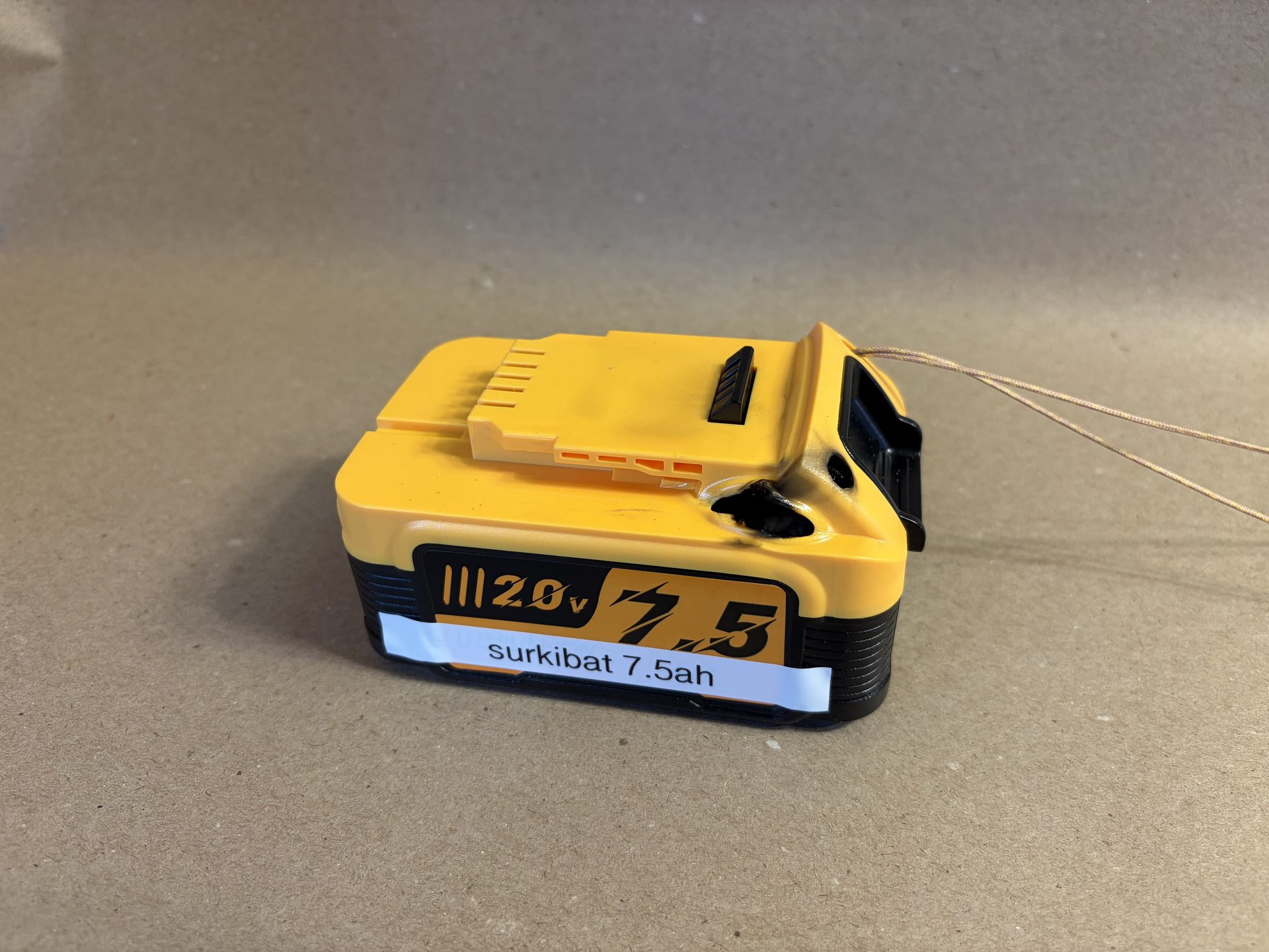 Heat buildup led to a plastic fire on the cell housing